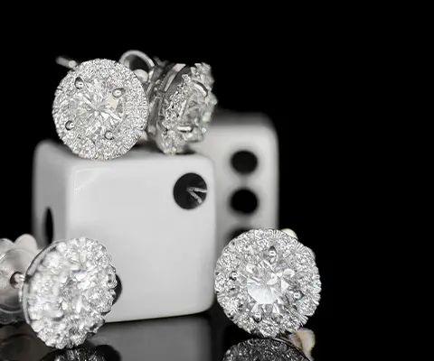 costellazione di luce orecchini con diamanti e dadi